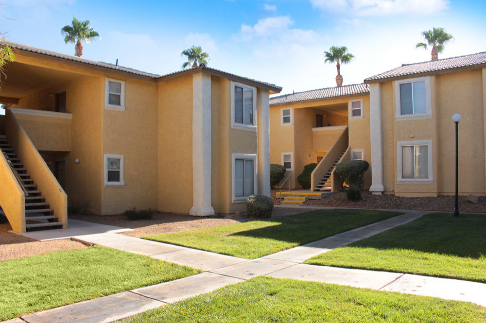 Exterior photo of Sunset Springs apartment Building Entrance 1